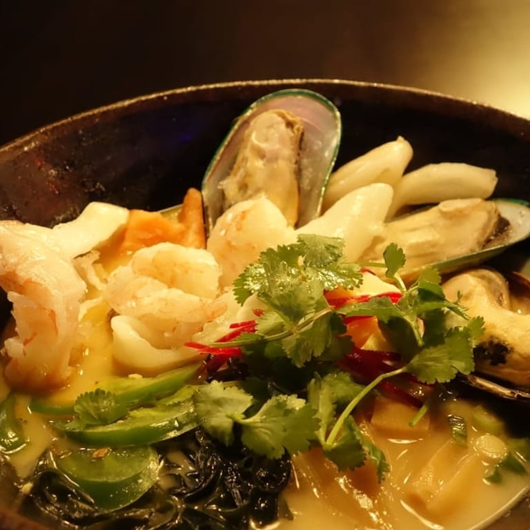 Savor our seafood ramen